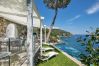 Villa a Nerano - AMORE RENTALS - Villa Ibiscus con Piscina a Sfioro, Discesa Diretta al Mare, Vista Mare, parcheggio e Colazione Villa a Nerano - AMORE RENTALS - Villa Ibiscus con Piscina a Sfioro, Discesa Diretta al Mare, Vista Mare, parcheggio e Colazione
