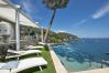 Villa a Nerano - AMORE RENTALS - Villa Ibiscus con Piscina a Sfioro, Discesa Diretta al Mare, Vista Mare, parcheggio e Colazione Villa a Nerano - AMORE RENTALS - Villa Ibiscus con Piscina a Sfioro, Discesa Diretta al Mare, Vista Mare, parcheggio e Colazione