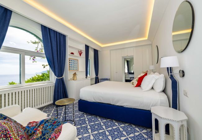 Villa a Positano - AMORE RENTALS - Villa Lo Scoglio con Accesso Diretto al Mare e Giardino  Villa a Positano - AMORE RENTALS - Villa Lo Scoglio con Accesso Diretto al Mare e Giardino