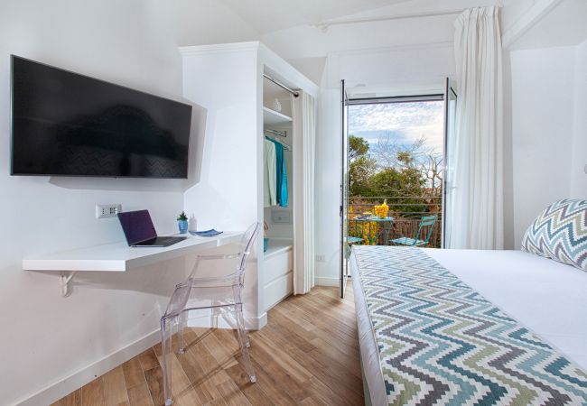 Villa a Massa Lubrense - AMORE RENTALS - Resort Ravenna - Villa Cavaliere con Terrazza, Piscina condivisa, Ideale per Eventi Villa a Massa Lubrense - AMORE RENTALS - Resort Ravenna - Villa Cavaliere con Terrazza, Piscina condivisa, Ideale per Eventi