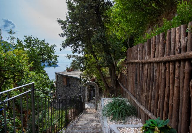 Villa a Positano - AMORE RENTALS - Villa Elio con Vista Mare, Piscina Riscaldata e Parcheggio