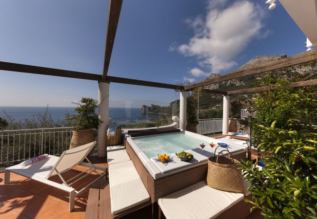 Villa/Dettached house in Nerano - AMORE RENTALS -Villa Giove with Private Swimming Pool, Sea View, Jacuzzi and Breakfast, Near the Sea