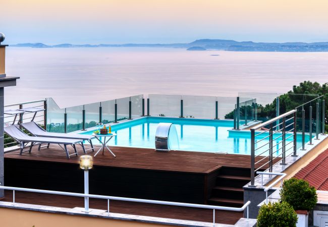 Villa in Sorrento - AMORE RENTALS -Villa Eva with Swimming Pool, SPA, Terraces, Sea View, Parking and Air Conditioning Villa in Sorrento - AMORE RENTALS -Villa Eva with Swimming Pool, SPA, Terraces, Sea View, Parking and Air Conditioning