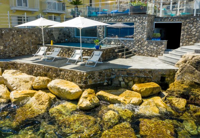 Villa in Sorrento - AMORE RENTALS - Villa del Maggiore with Direct Access to the Sea, Sea View, Garden and Private Swimming Pool Villa in Sorrento - AMORE RENTALS - Villa del Maggiore with Direct Access to the Sea, Sea View, Garden and Private Swimming Pool